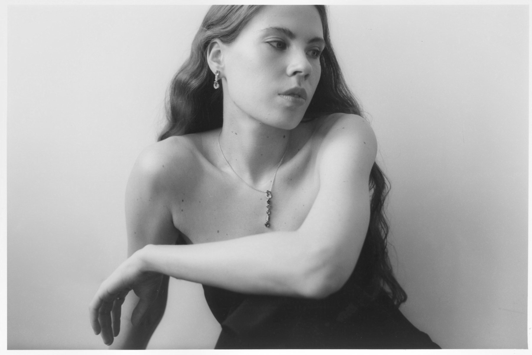 Portrait of Angelina Belokon, seated, on film
