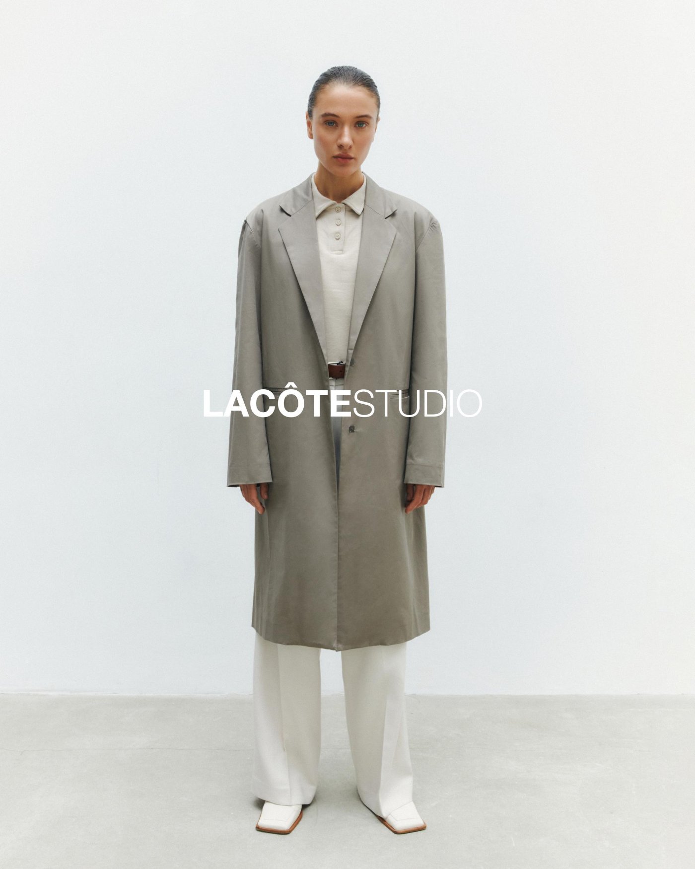 LA CÔTE — lookbook, grey coat over a polo and white trousers