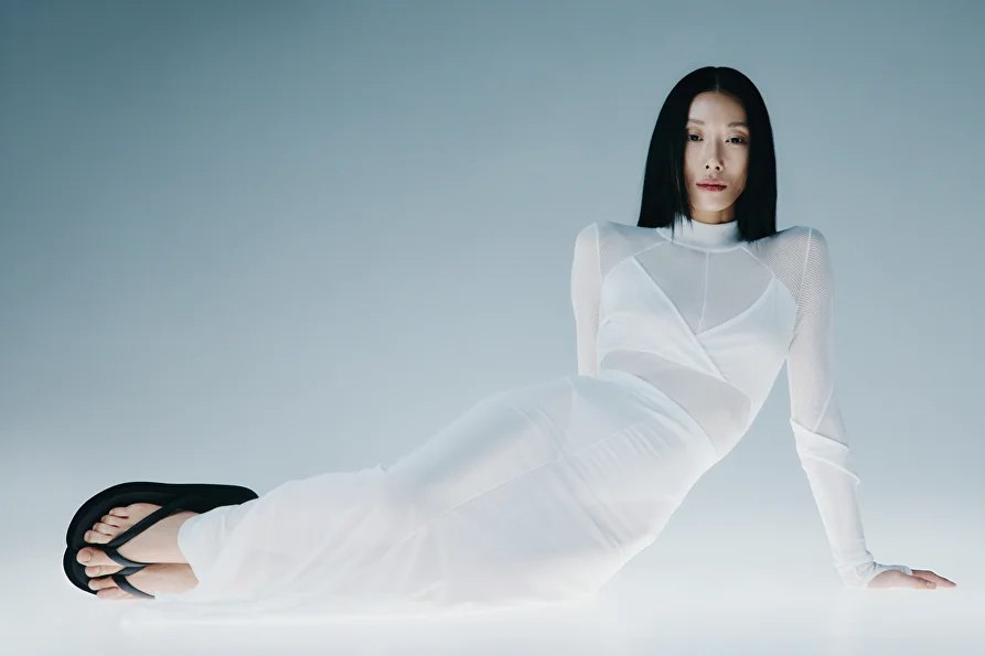 MIOGI LI — white mesh dress, reclining figure