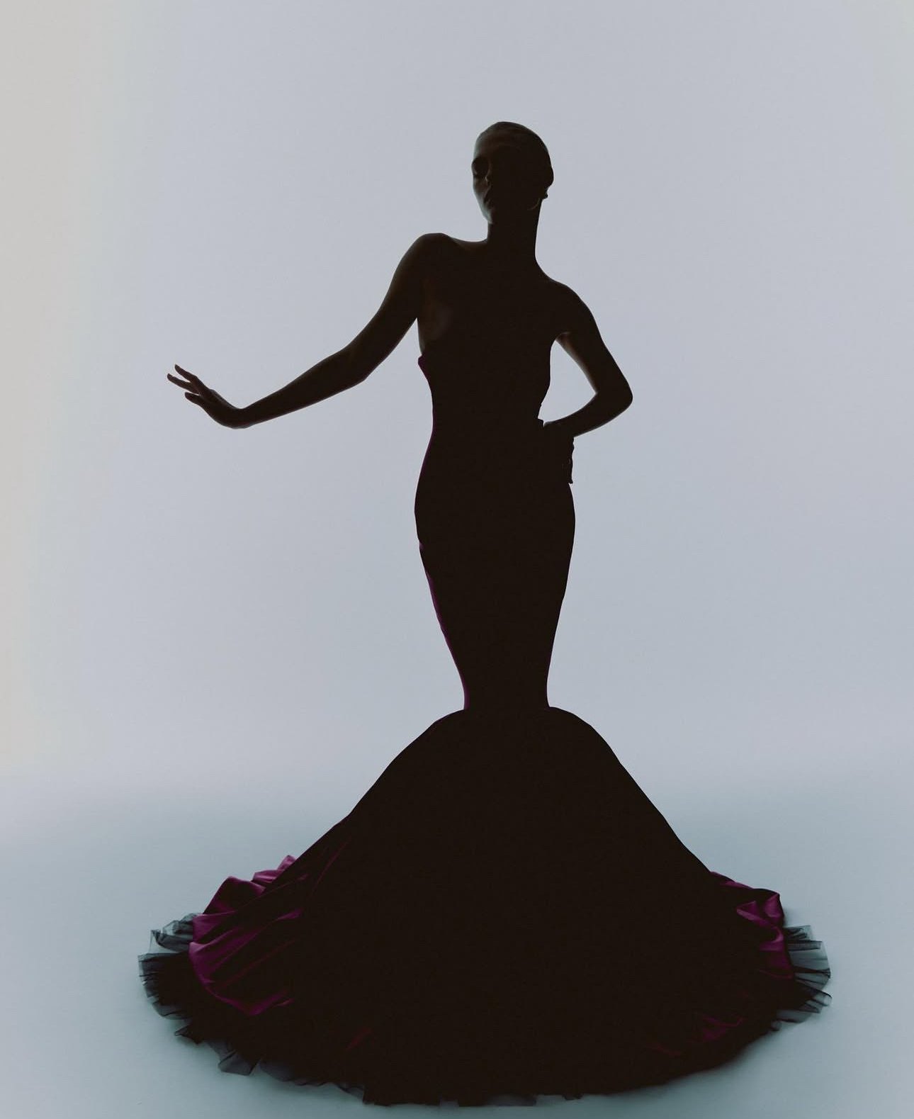 KAMILLA PURSHIE — silhouette in a mermaid gown with a magenta hem