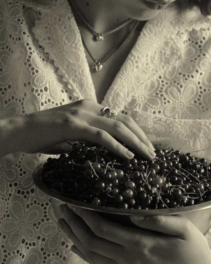SHU SHA — bowl of currants in lace, flower ring on the hand